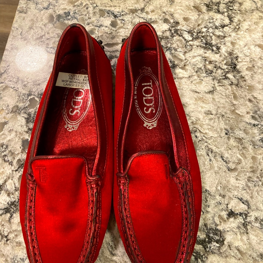 Tod’s ruby red satin driving shoe Gommini’s.